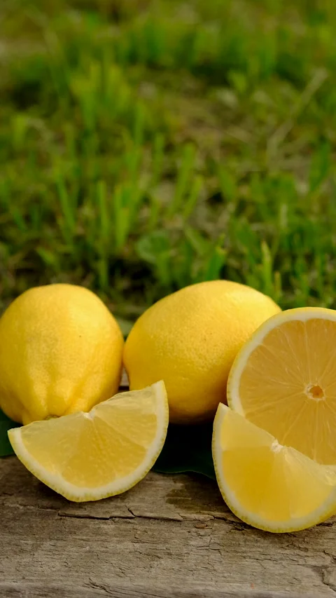 Lemon essential oil in a bottle. Selective focus. Stock Footage 312627886
