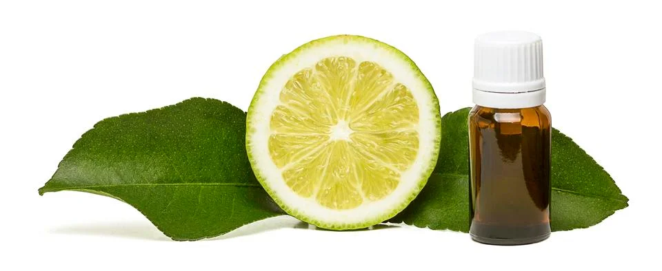 Lemon essential oil with two side leaves Stock Photos
