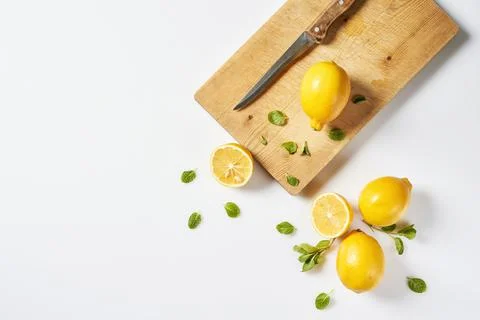 Lemon fruit on cutting board Stock Photos