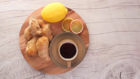 Lemon Ginger Tea: Fresh Brew with Citrus and Spice Stock Footage 343658129