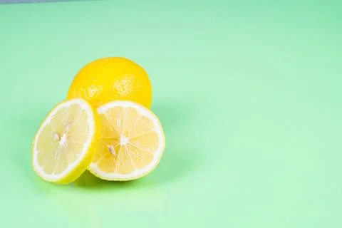 Lemon on green background Foto stock