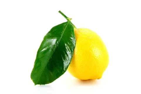 Lemon with green leaf Stock Photos