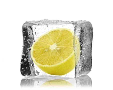 Lemon in ice cube  Stock Photos