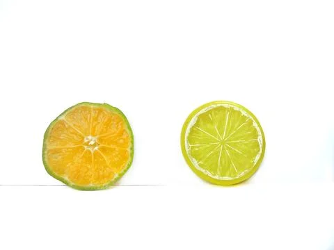 Lemon isolated.2 Round slice of ripe lemon on a white background. Fresh fruits Stock Photos
