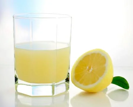Lemon juice Stock Photos