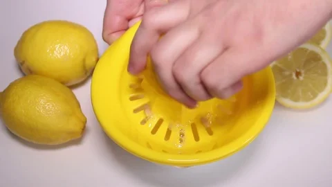 Lemon Juice Squeeze Stock Footage 73459246