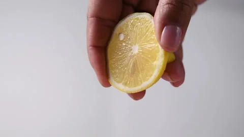 Lemon juice squeezing. Stock Footage 131998469