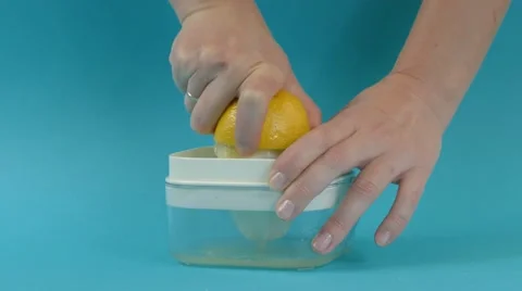 Lemon juicing and squeezing, 4k Stock Footage 60777329