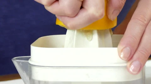 Lemon juicing, close up, 4k Stock Footage 63298040