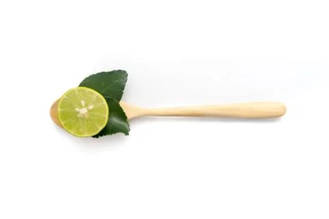 Lemon with kaffir lime leaf inside spoon Foto stock