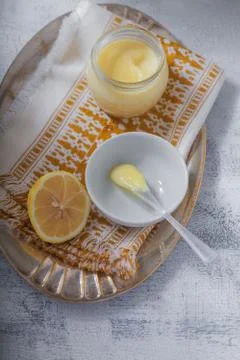Lemon kurd with a spoon Stock Photos
