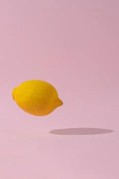 A lemon is levitating in the air Stock Photos