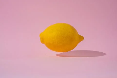 A lemon is levitating in the air Stock Photos