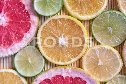 Lemon, Lime and grapefruit sliced in top view Stock Photos