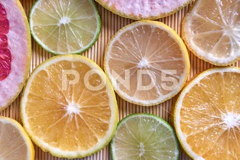 Lemon, Lime and grapefruit sliced in top view Stock Photos
