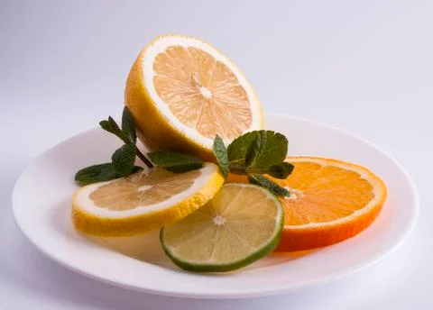 Lemon, lime and orange Stock Photos