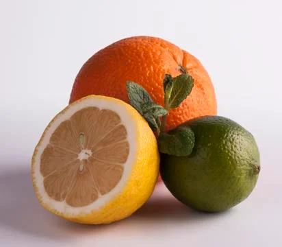Lemon, lime and orange Stock Photos