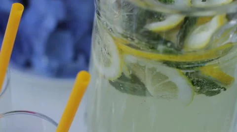 Lemon, lime. Freshness. White table with sweets on nature. Wedding cakes and flo Stock Footage 61715219