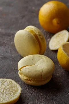 Lemon macaroons on a dark background Stock Photos