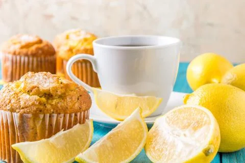 Lemon Muffins with cup of tea / coffee Stock Photos