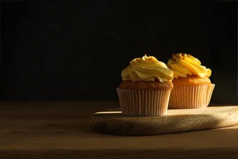 Lemon muffins on a dark background 스톡 사진