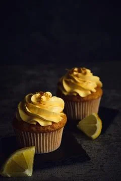 Lemon muffins on a dark background Foto stock