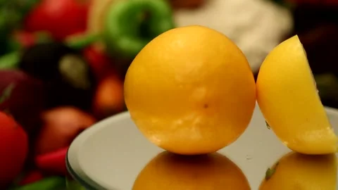 Lemon with other fruit in the background Stock Footage 241706705