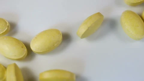 Lemon oval pressed tablets without shell throw down, vitamin C. Real time, copys Stock Footage 144854385