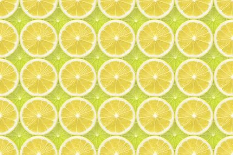 Lemon over lime background Stock Photos
