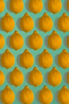 Lemon pattern isolated on blue background. Flat lay Stock Photos