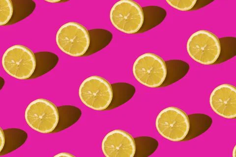Lemon pattern on a pink background. Pop art design, creative citruses. Yellow Stock Photos