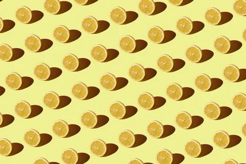 Lemon pattern on a yellow background. Pop art design, creative citruses. Yellow Foto stock