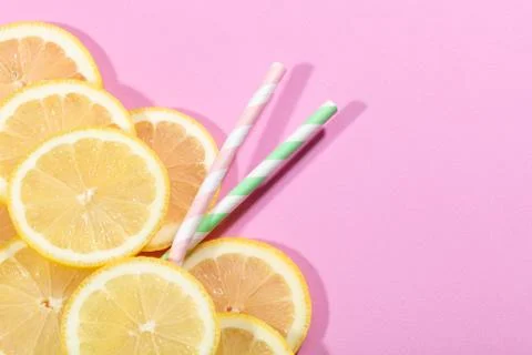 Lemon on pink background Stock Photos