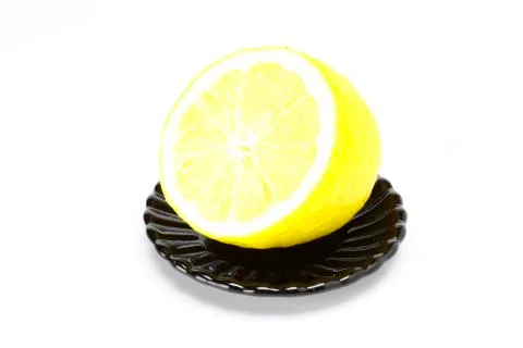 Lemon on a plate Stock Photos