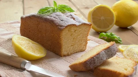 Lemon pound cake on rustic wooden background with lemon. Stock Footage 164224707