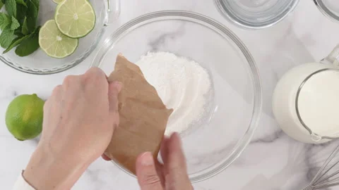 Lemon pudding or lemon curd served with mint leaves and sliced lemon recipe. Stock Footage 144922991