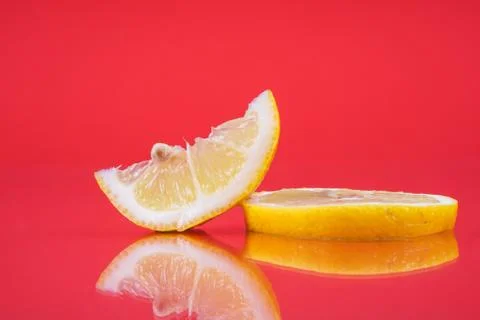 Lemon on red background Foto stock