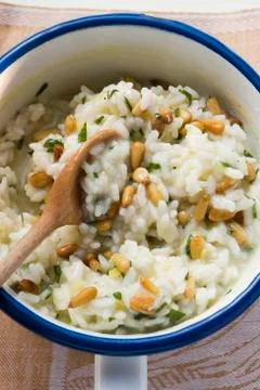 Lemon risotto with pine nuts Stock Photos