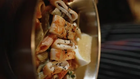 The lemon is roasted with fire. Slow motion. 120 fps. Vertical video Stock Footage 172440097