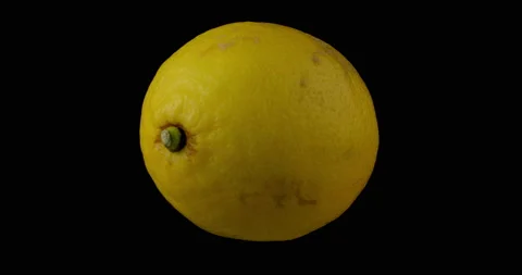 Lemon rotating with black background Stock Footage 233546850