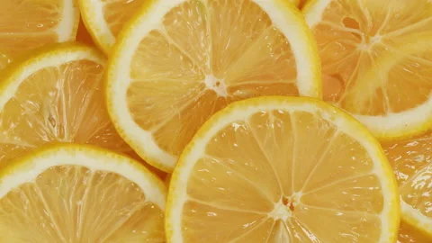 Lemon rotating top view, fresh and ripe citrus fruits circles. Healthy eating Stock Footage 170146612