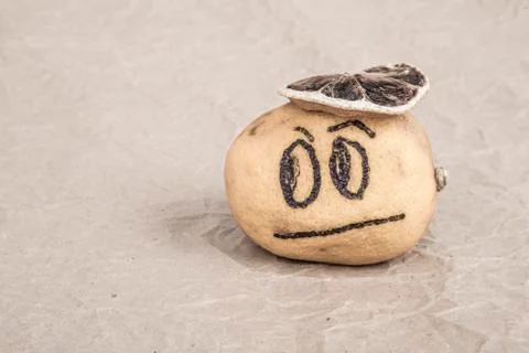 Lemon with sad expression Stock Photos