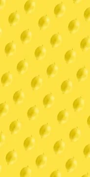 Lemon as seamless pattern isolated on yellow background Stock Photos