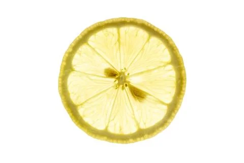 Lemon slice backlit on white background Foto stock