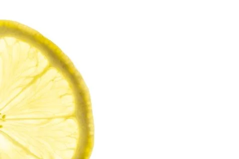 Lemon slice backlit on white background 스톡 사진