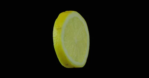 Lemon slice with black background Stock Footage 233580297