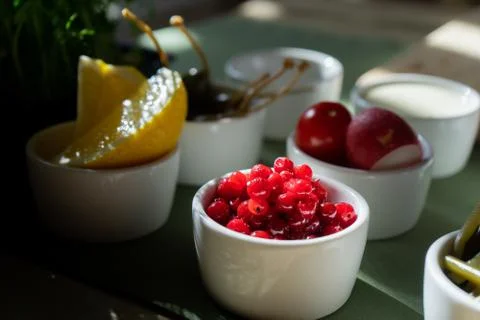 Lemon slice isolate. Cut lemon slice side view. Lemon slice with zest isolated Stock Photos