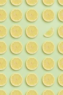 Lemon slice pattern on a green background Stock Photos