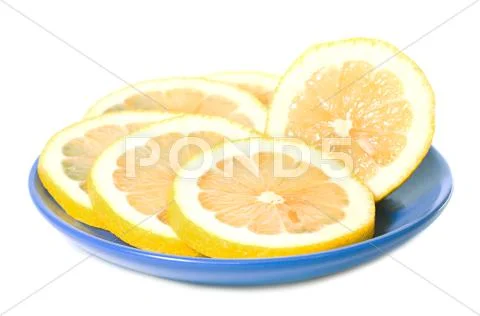 Lemon slice in saucer Stock Photos
