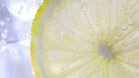 Lemon slice in the soda glass with bubbles Stock Footage 103606780